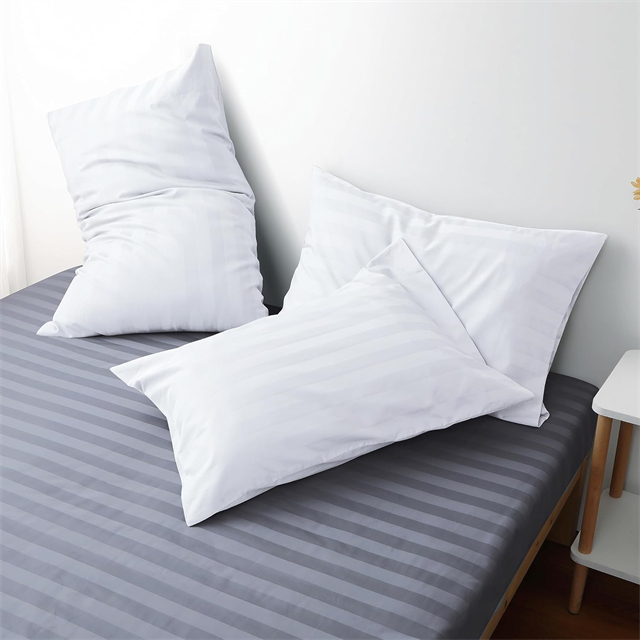 Oreiller de l'hôtel à rayures à coque à 100% confortable